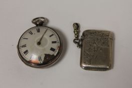 A silver vesta case, Chester 1905, together with a silver pocket watch, London 1783. (2) Vesta