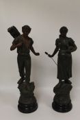 A pair of French patinated spelter figures-Farmer and Wife, on wooden socle, height 65 cm. (2)
