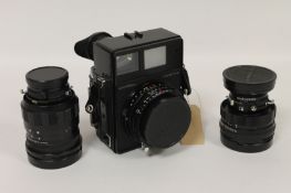 A Mamiya Universal, with Sekor 50mm lens, No. 26386, 150mm lens, No. 20133, 100mm lens, No.