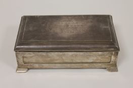 A silver cigar box, London 1910, 42 oz. (Presented to W.L.Campbell by The Officers 1st Battalion The
