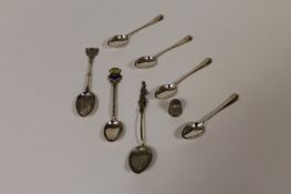 Six silver teaspoons, together with a silver thimble and a Japanese silver spoon. (8) Good