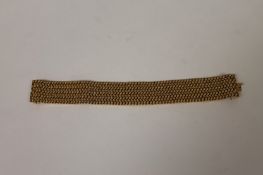 An 18ct gold cuff bracelet, 36.8g. Good condition, 19.5 cm length.