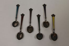 A harlequin set of six Norwegian sterling silver and enamel teaspoons. (6) Good condition.
