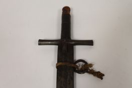 A nineteenth century Sudanese Kaskara, blade length 91 cm. Double edged steel blade with spatulate
