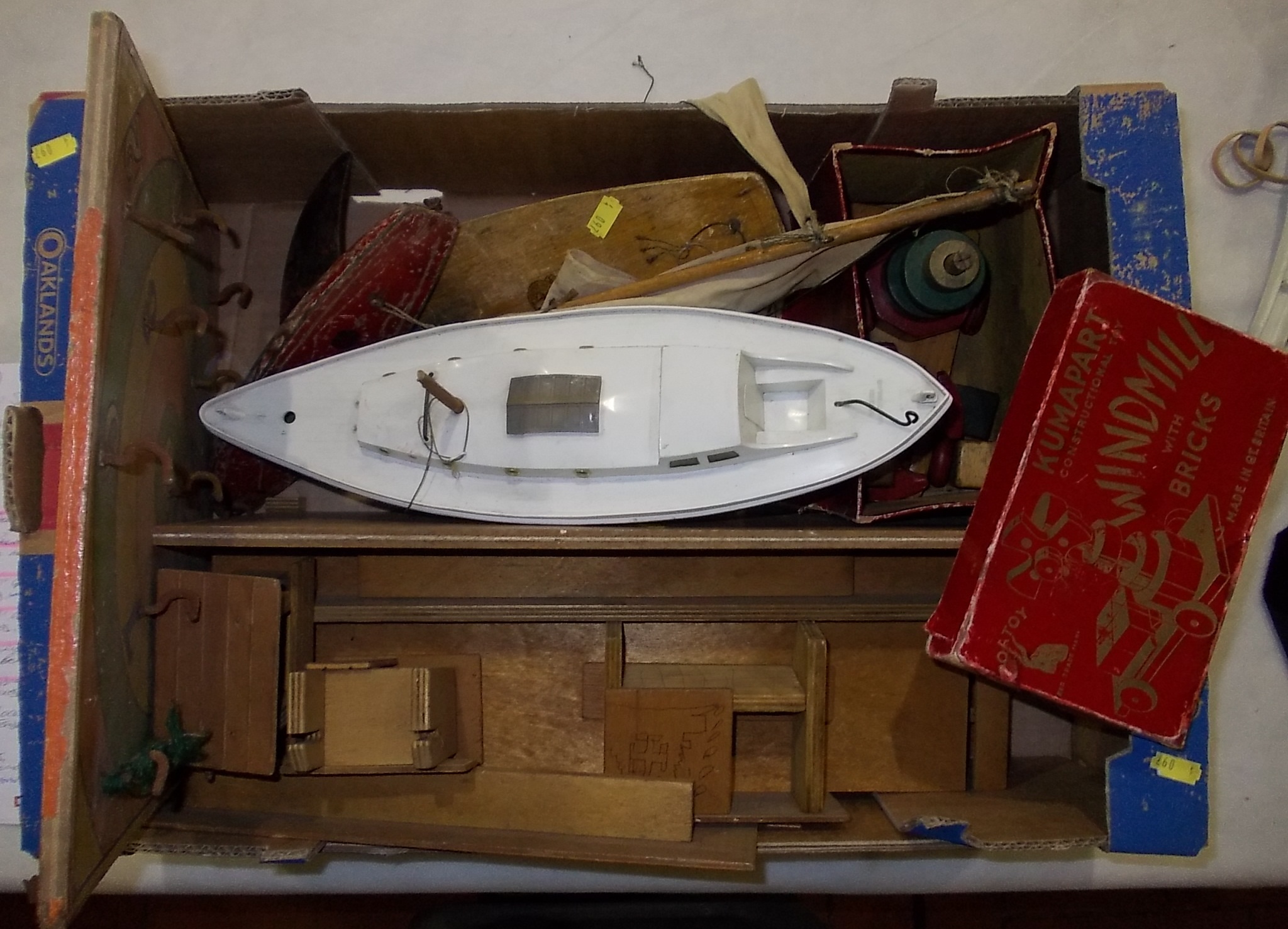 Box of early wooden toys including 2 Star yachts & a Penguin yacht.