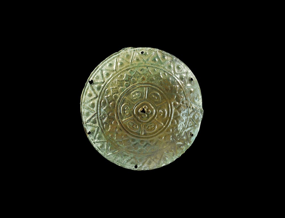 Anglo-Saxon Bronze Embossed Disc 6th century AD . A sheet bronze disc, dished in profile, embossed