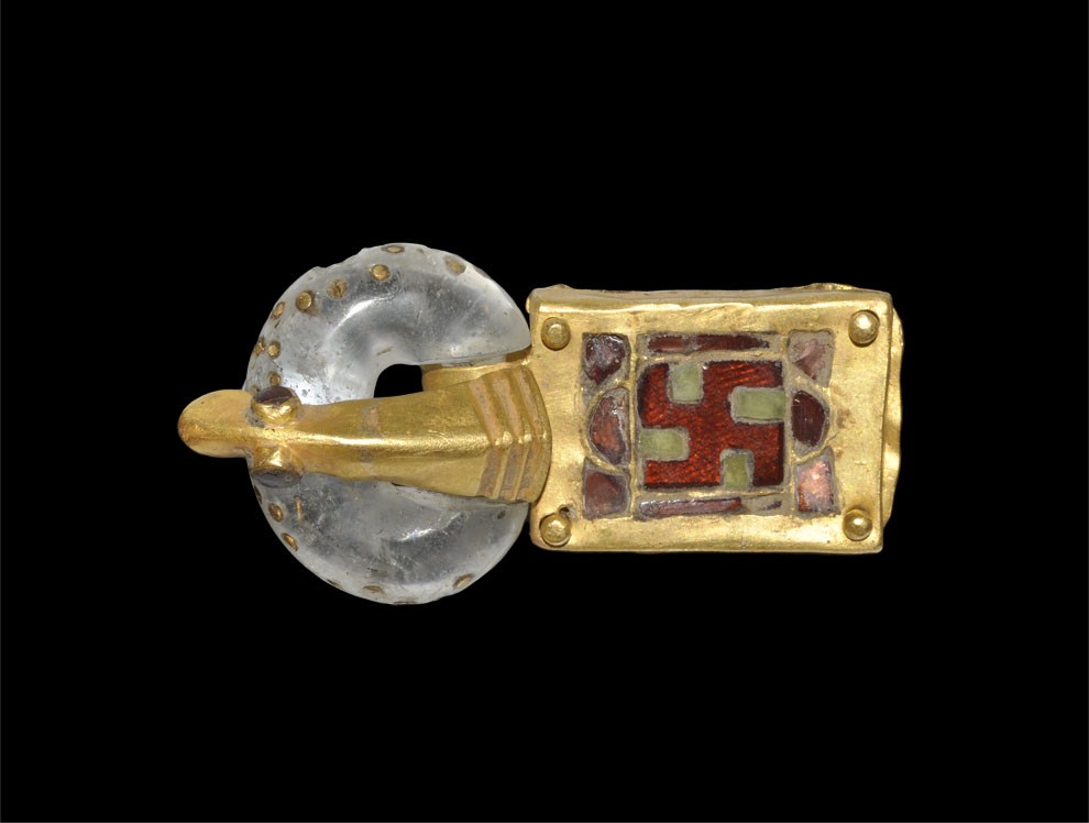 Ostrogothic Gold and Garnet Buckle with Crystal Loop 6th century AD . A gold buckle comprising a