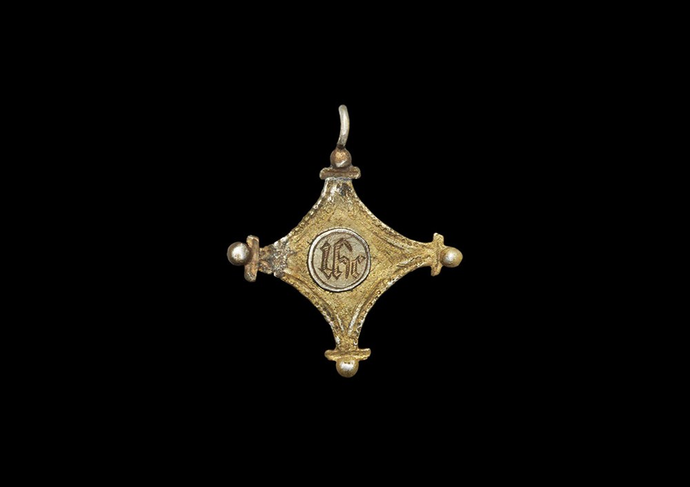 Medieval Silver-Gilt IHC Cross Pendant 14th century AD . A silver-gilt cruciform pendant with