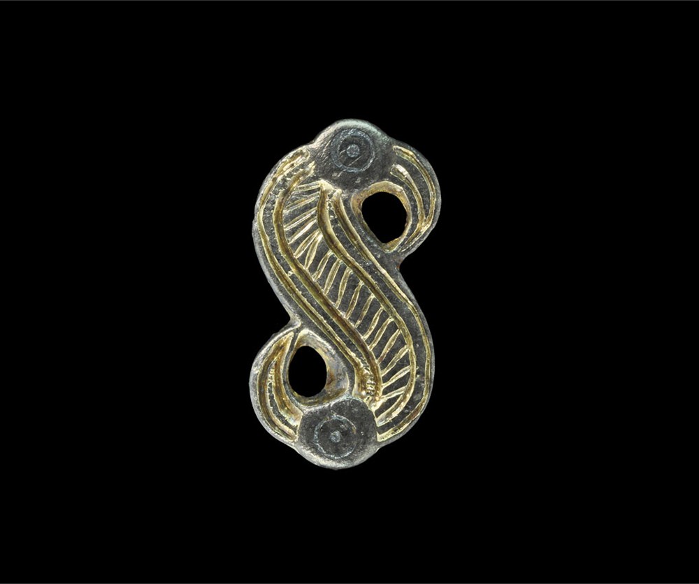 Anglo Saxon Frankish Silver-Gilt S-Shaped Brooch 6th century AD . A cast s-shaped plate brooch with