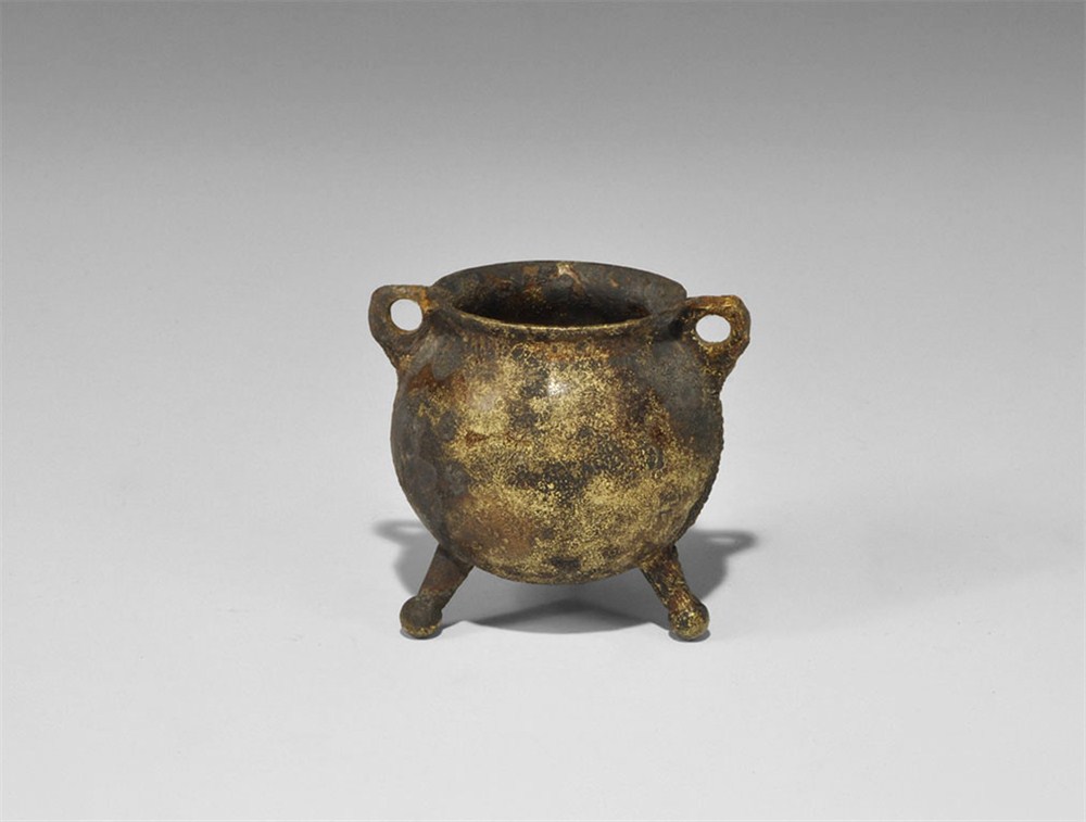 Tudor Brass Miniature Cauldron 16th century AD . A cast brass miniature or toy cauldron, globular