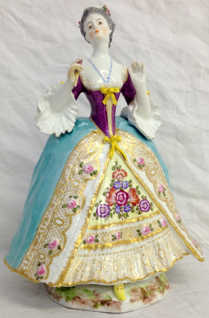 Meissen style porcelain figure with hand painted flower decoration C1900