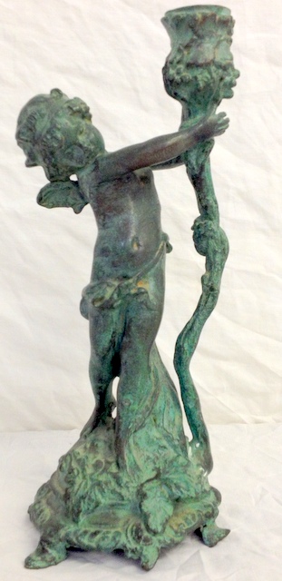 Bronzed candlestick of a cherub 28cm