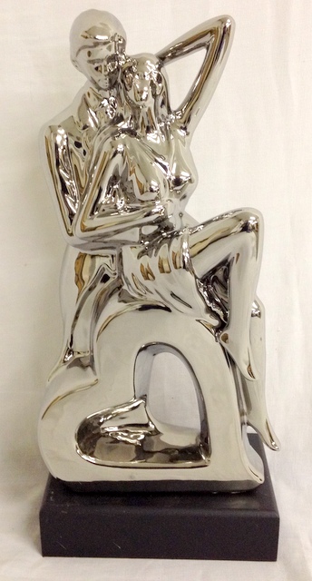 Silver coloured porcelain figure of lovers