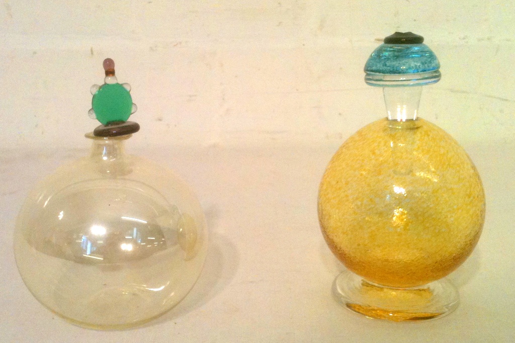 Two glass scent bottles.