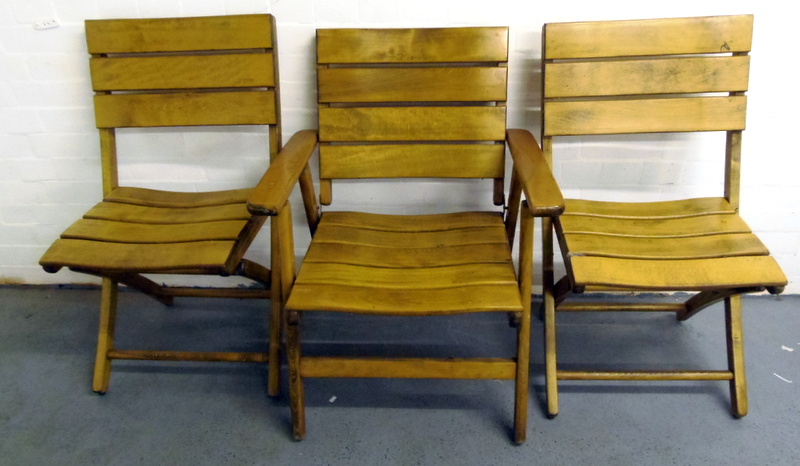 Three wooden folding garden chairs