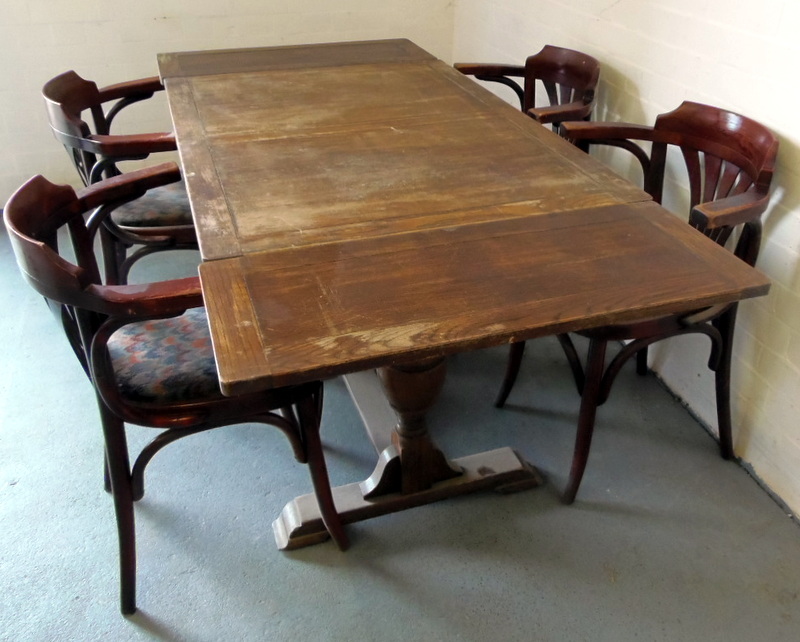 Table and four carver chairs