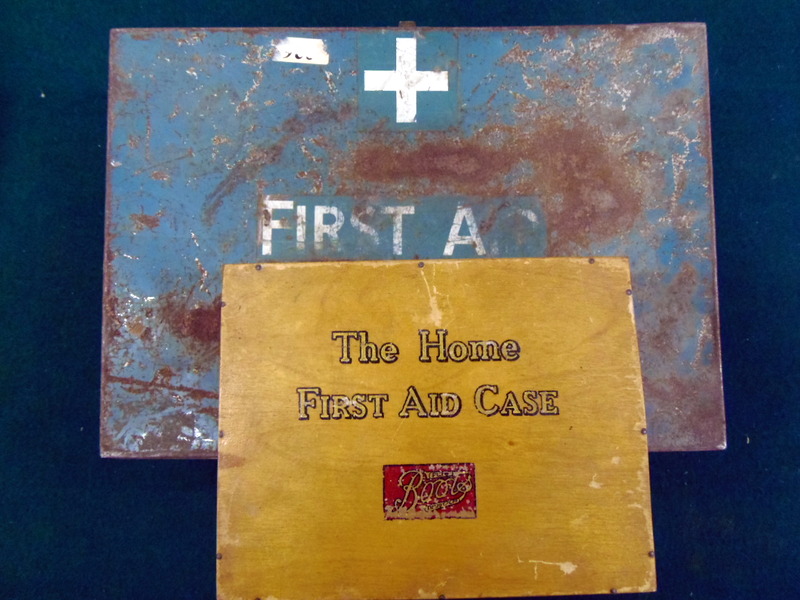 Two old First Aid boxes with contents