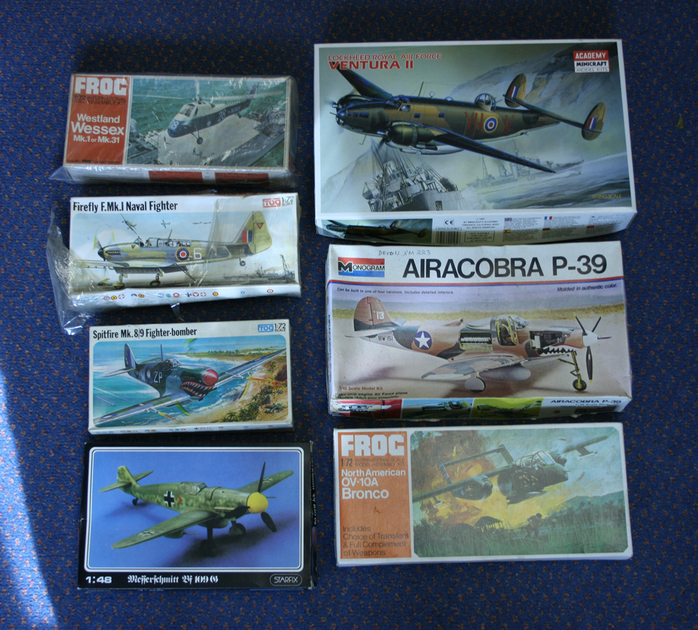 A collection of plastic model kits, including an Airfix SR-N4 hovercraft, an AWACS E-30 beam engine,