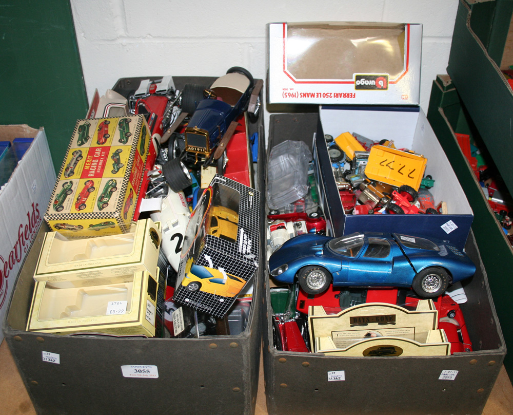 A collection of die-cast and plastic racing cars, cars and commercial vehicles, some boxed (playwear