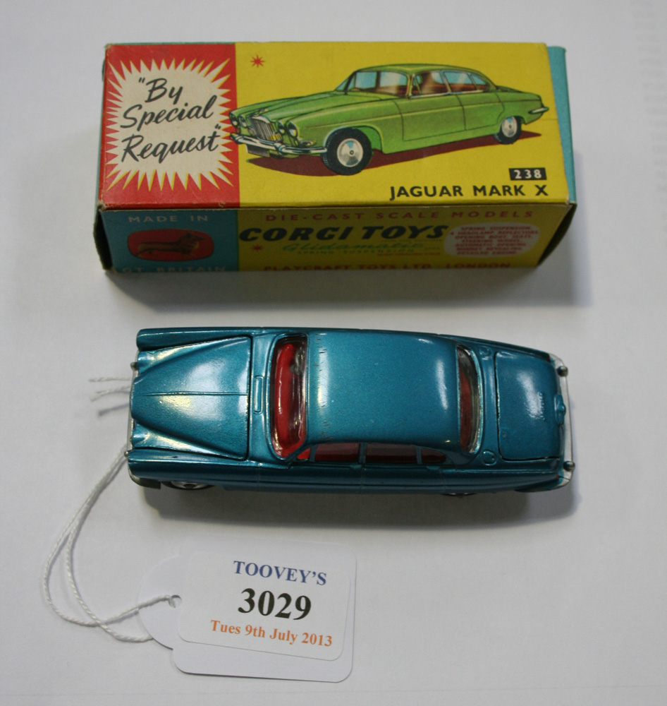 A Corgi Toys No. 238 Jaguar mark X, finished in blue with luggage in boot, boxed (box lightly