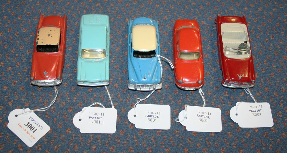 A small collection of French Dinky Toys American cars, comprising a No. 24a Chrysler New Yorker, a