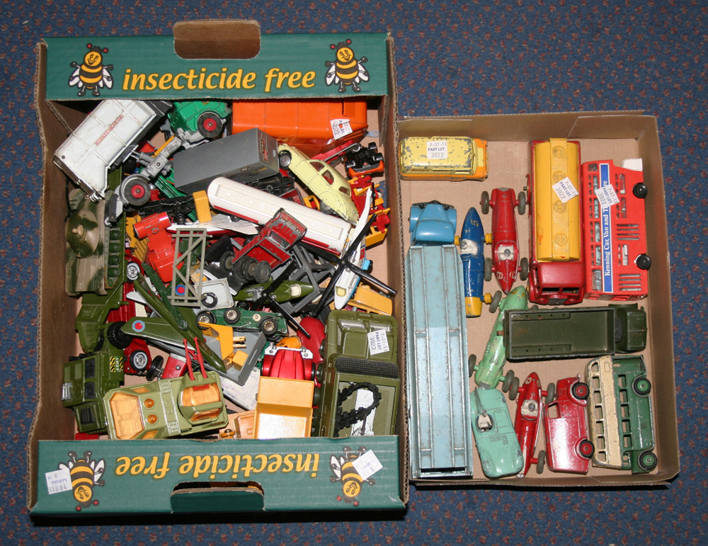 A small collection of Dinky Toys vehicles, including a No. 234 Ferrari, a Pullmore car transporter