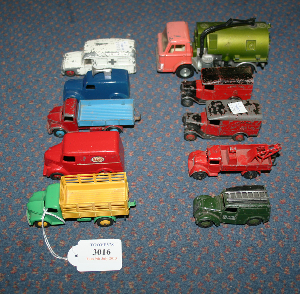 A small collection of Dinky Toys commercial vehicles, comprising a No. 261 telephone service van,