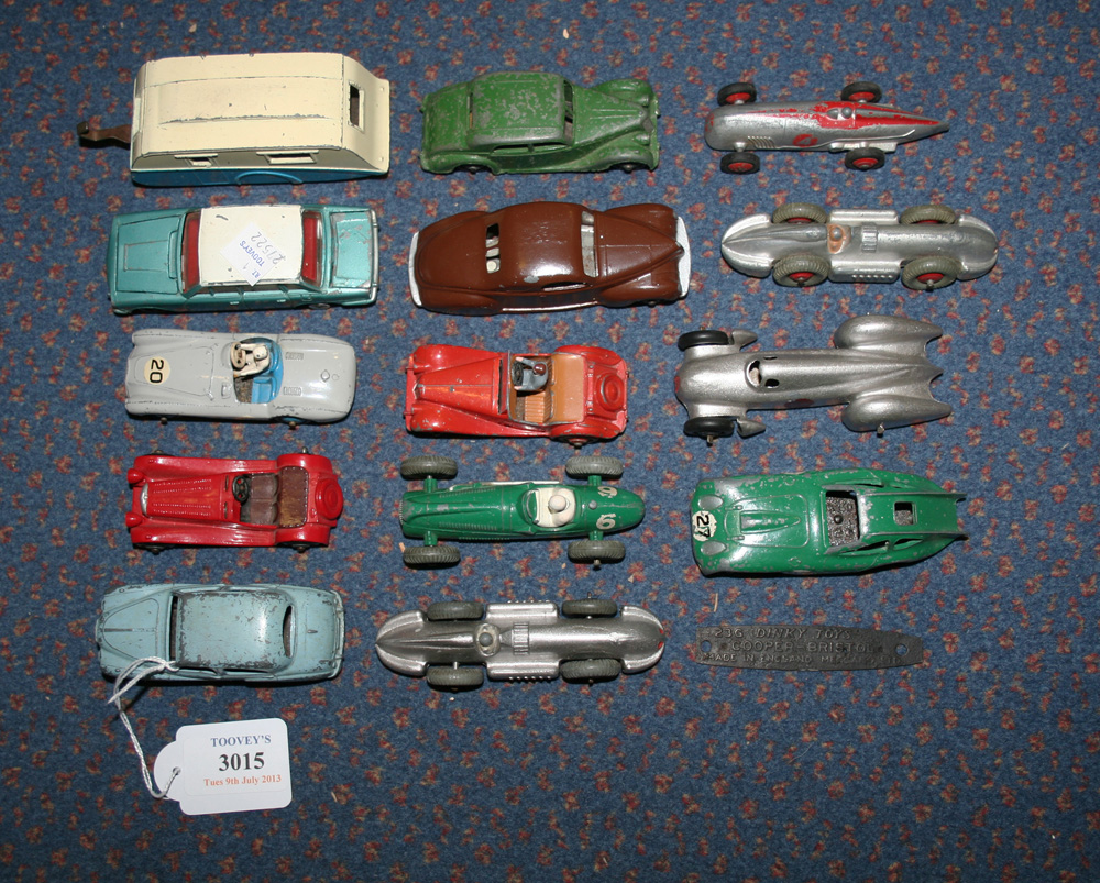 A small collection of Dinky Toys cars and racing cars, including a No. 39c Lincoln Zephyr, a No. 161