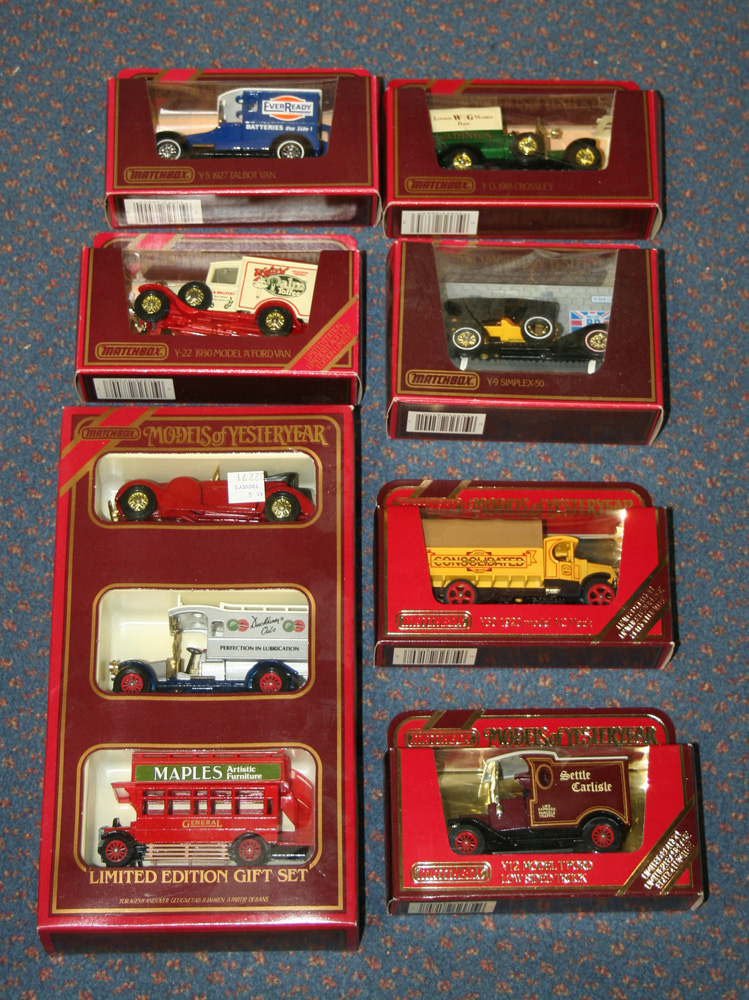 A collection of Matchbox Models of Yesteryear cars and commercial vehicles, within burgundy and