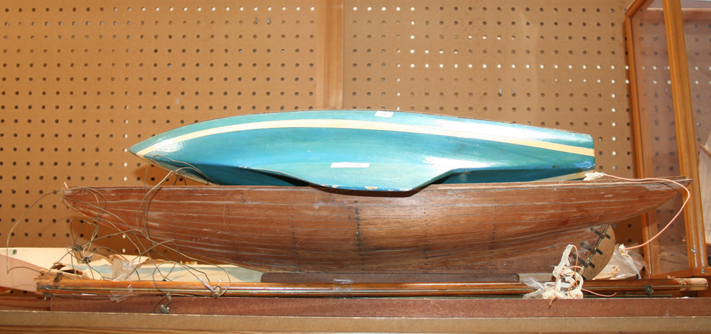 A pond yacht with faux planked deck and blue painted hull, length approx 53.5cm, and an unfinished
