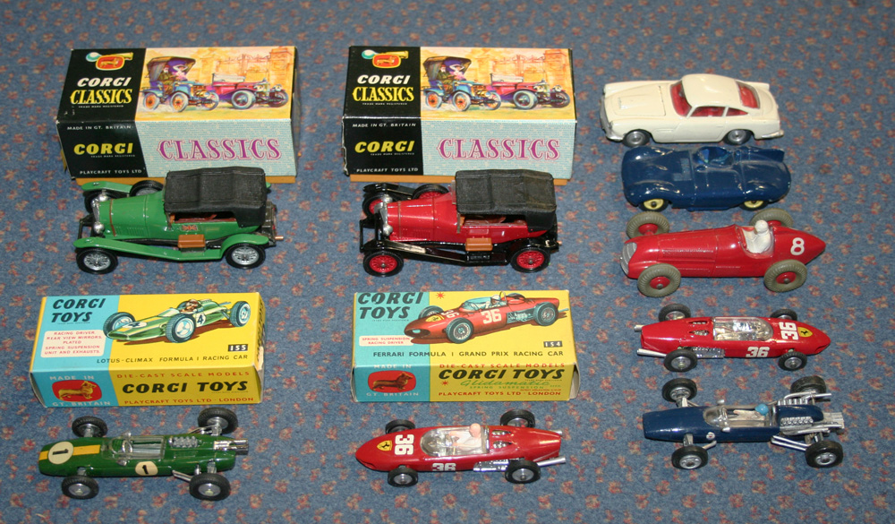 A small collection of Corgi Toys cars, comprising a No. 154 Ferrari formula one, a No. 155 Lotus