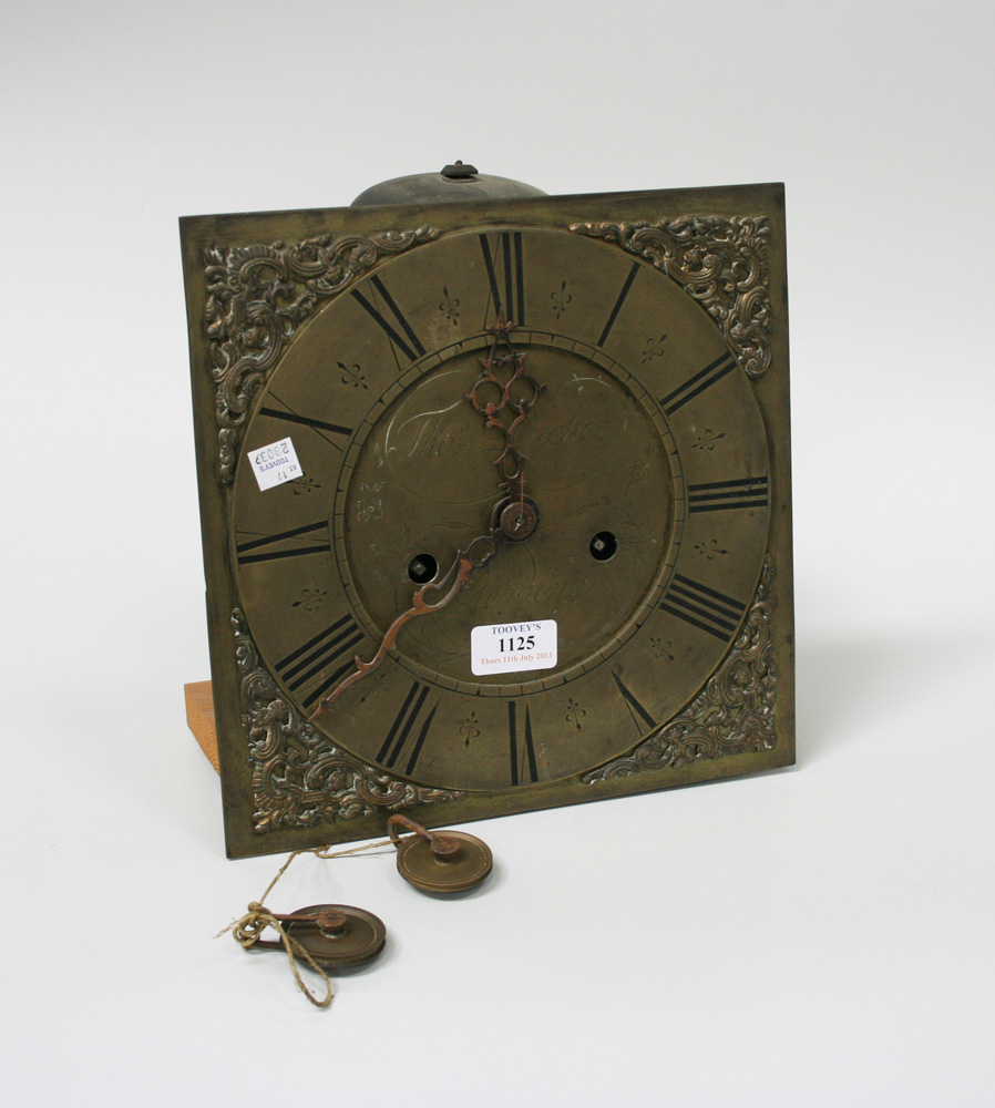 An early 19th Century brass longcase clock dial with eight day movement striking on a bell, the