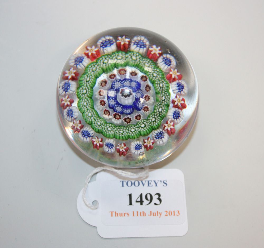 A French patterned millefiori glass paperweight, probably Baccarat or Clichy, mid-19th Century, of