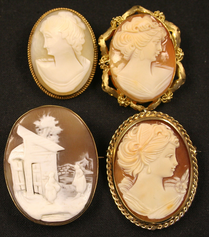 A 9ct gold mounted oval shell cameo pendant brooch carved as the portrait of a lady, two gold