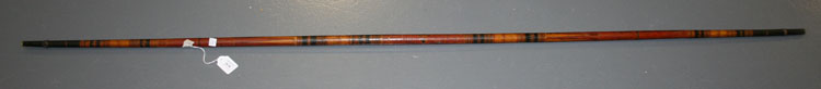A 19th Century Indian polychrome painted ceremonial staff, length approx 190cm.