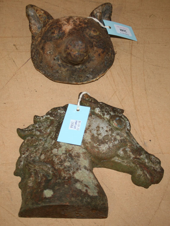 A 19th Century cast iron fox mask and a similar profile plaque of a horse`s head.