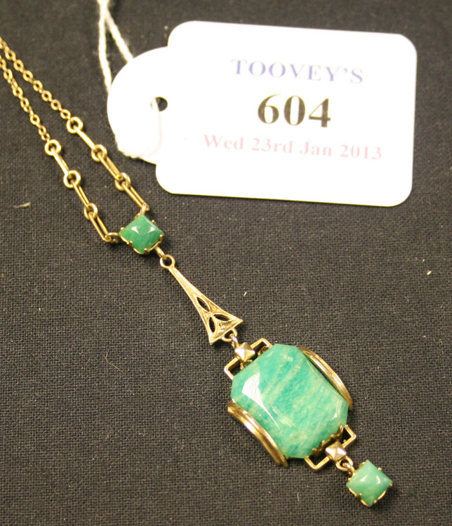 A gold and aventurine pendant necklace, the top set with a small square aventurine above a cut