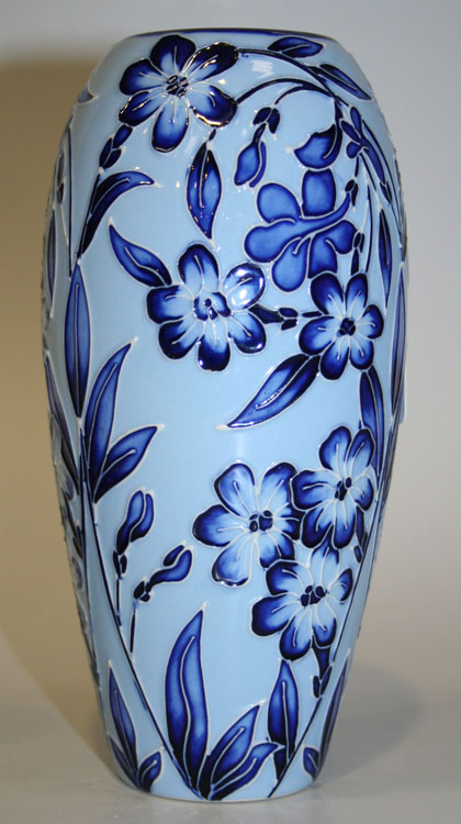 A Moorcroft Pottery trial vase, dated 2004, designed by Carole Lovatt, the tapered ovoid pale blue