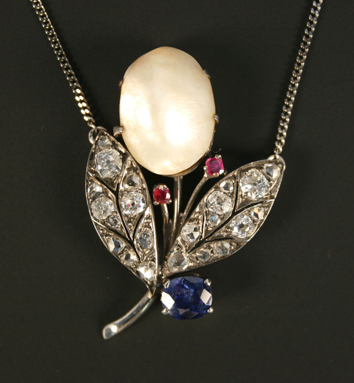 A diamond, sapphire, ruby and blister pearl set pendant necklace, designed as a stylized floral