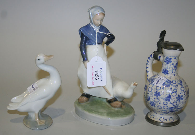 A Royal Copenhagen porcelain figure of a goose girl, circa 1975, green printed factory mark to