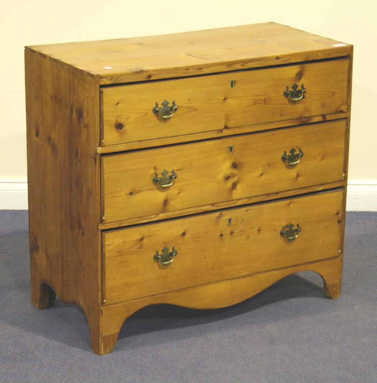 A 20th Century stripped pine chest of three long drawers, on bracket feet, height approx 78cm, width