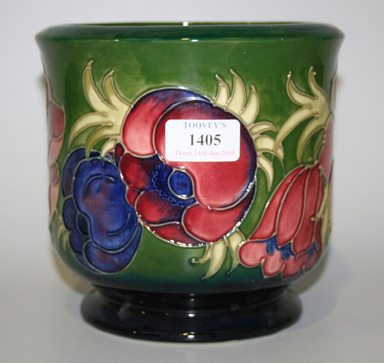 A Moorcroft Pottery green ground jardinière, 1970s, decorated with anemone, impressed factory mark