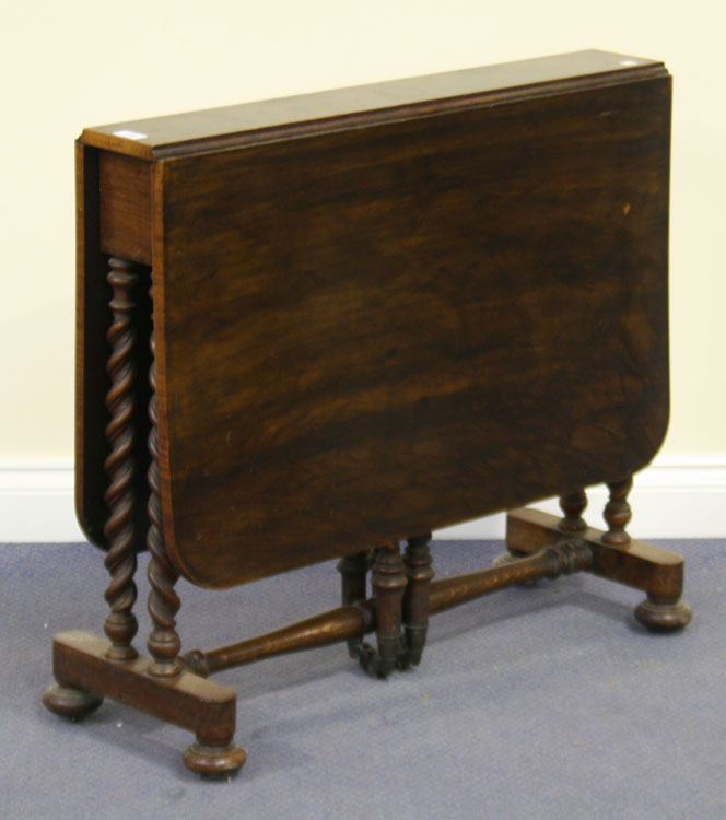 A Victorian walnut Sutherland table, on barley twist supports and bun feet, width approx 82cm.