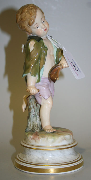 A Meissen porcelain figure of Cupid in disguise, late 19th/early 20th Century, modelled as a