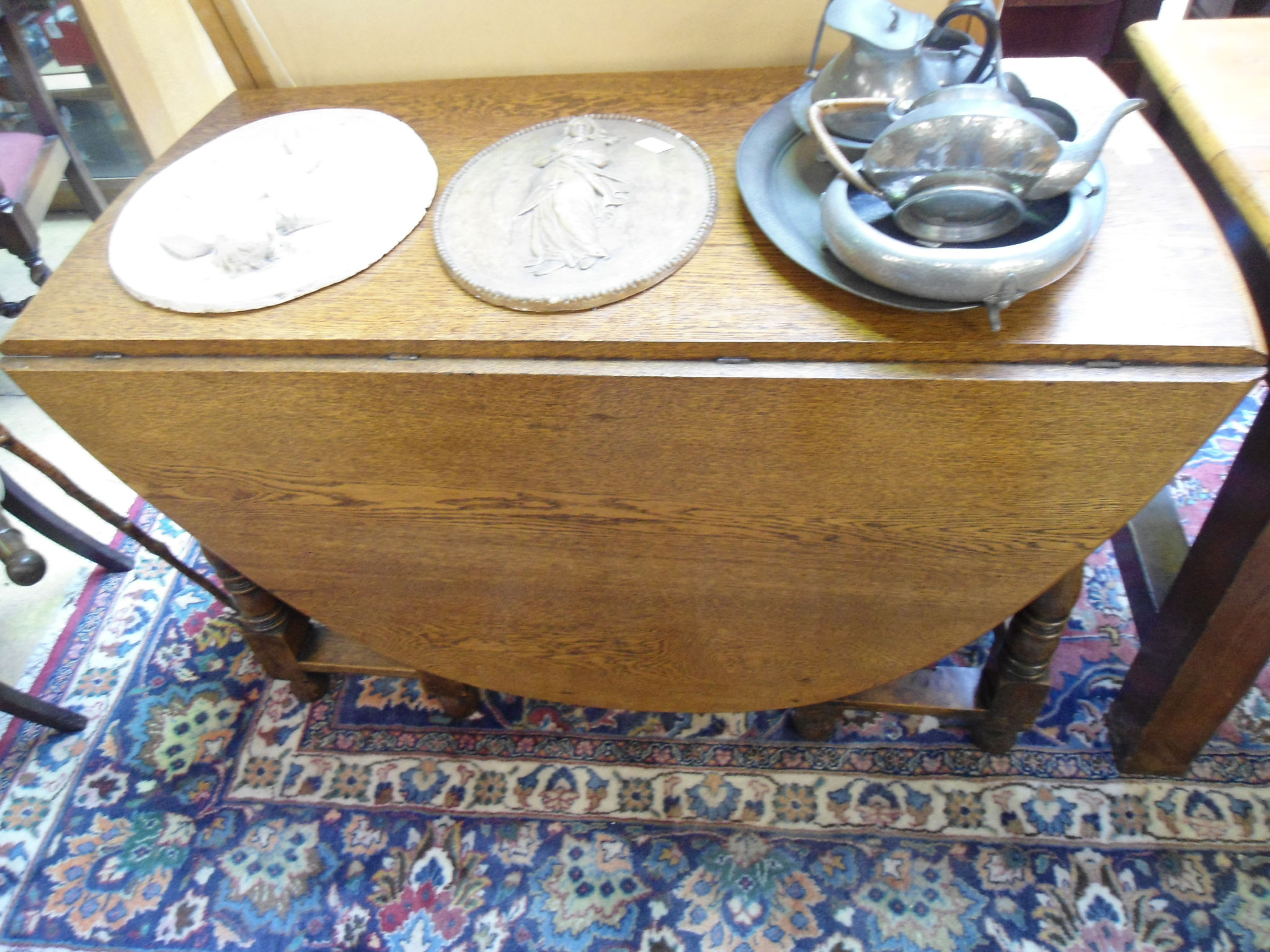 A large early 20thC oak gateleg table