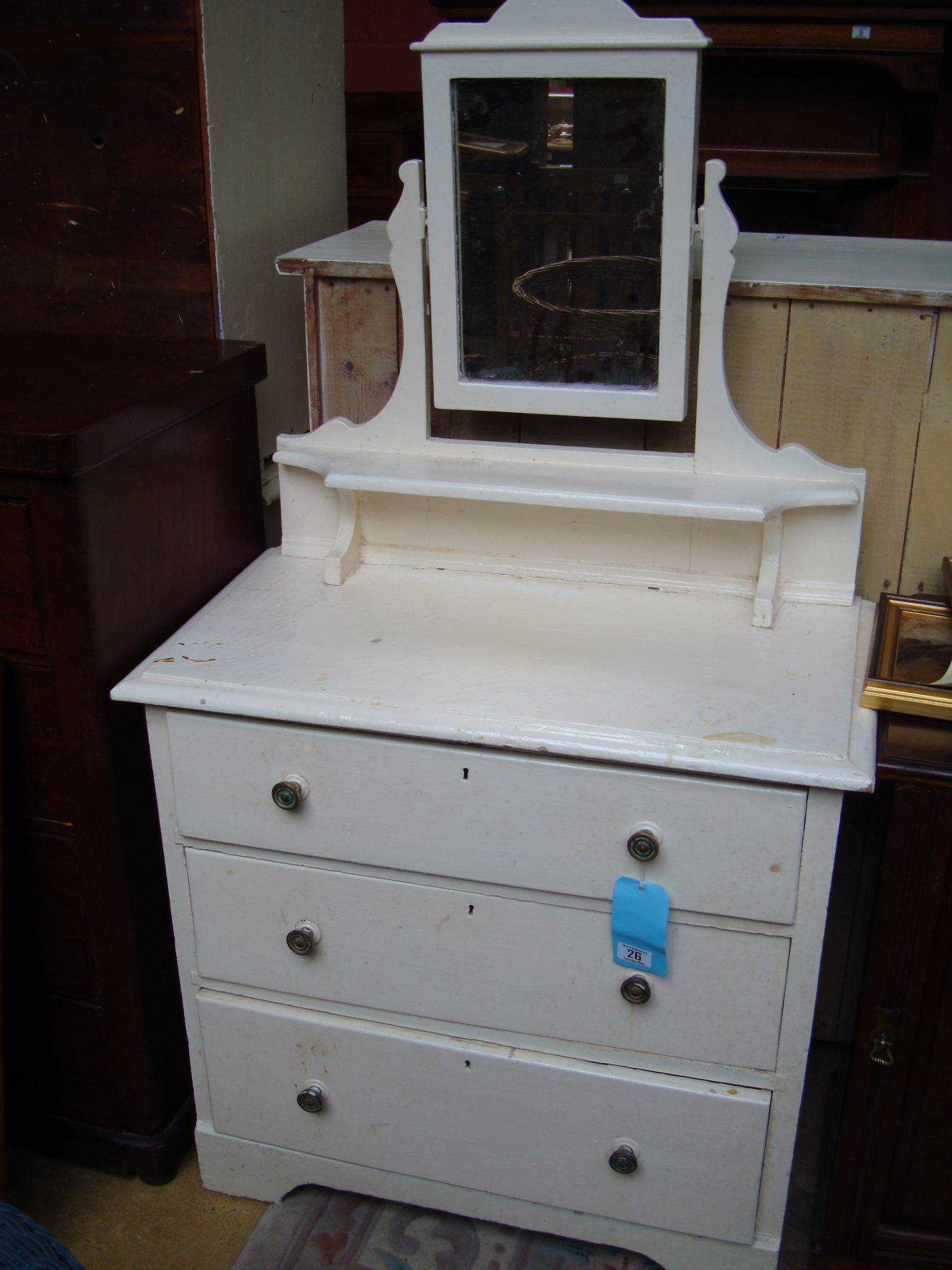A late 19th century white painted dressing table