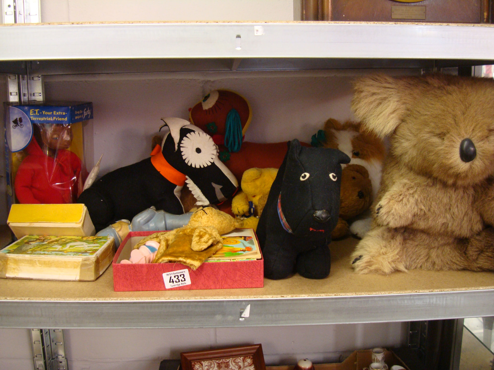 A Chiltern`s Sooty hand puppet, a plush koala, three picture blocks, and sundry soft toys