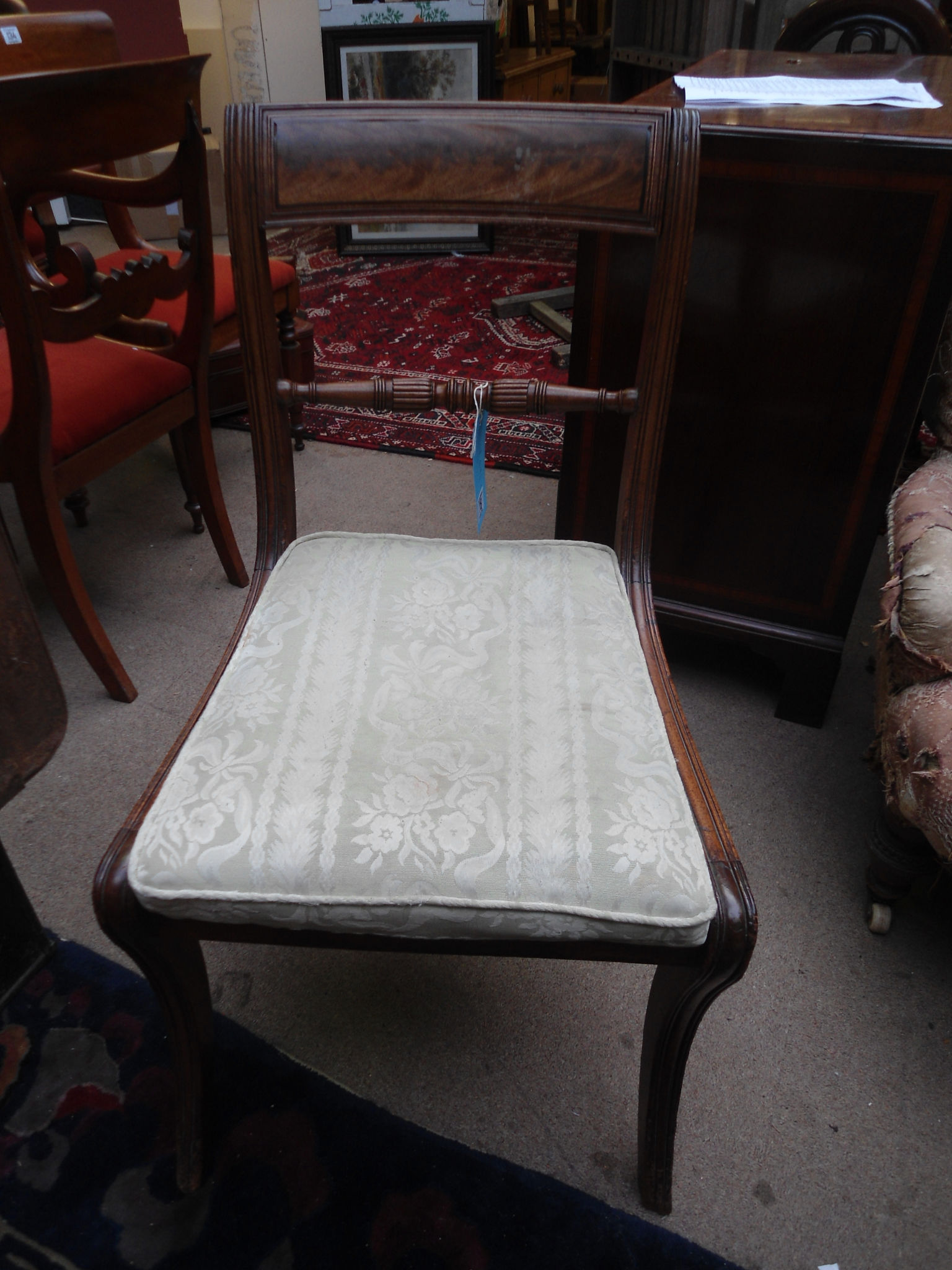 A pair of Regency mahogany dining chairs