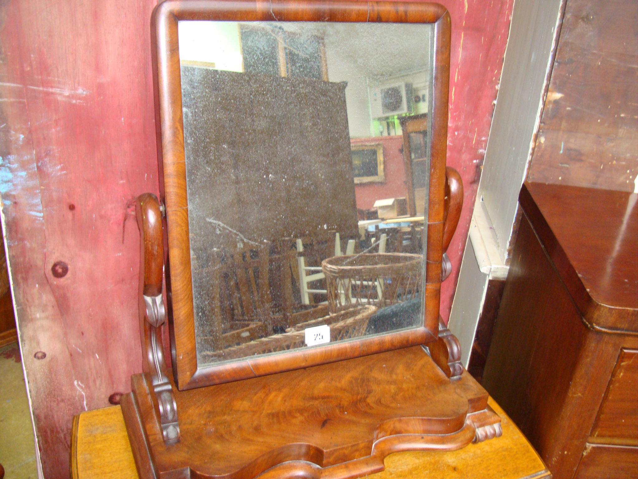 A mid Victorian mahogany swing toilet mirror