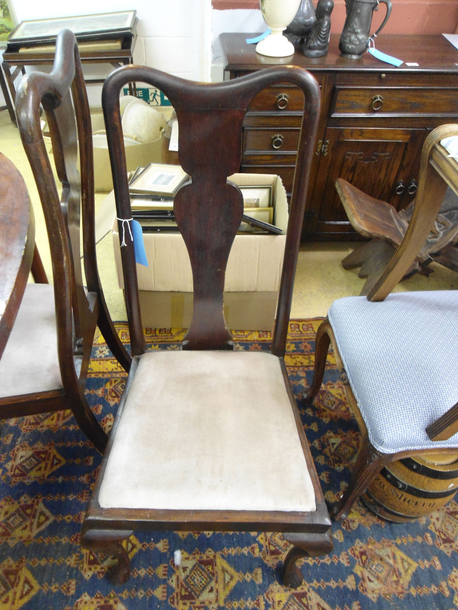 A set of four 20th century George I style mahogany dining chairs